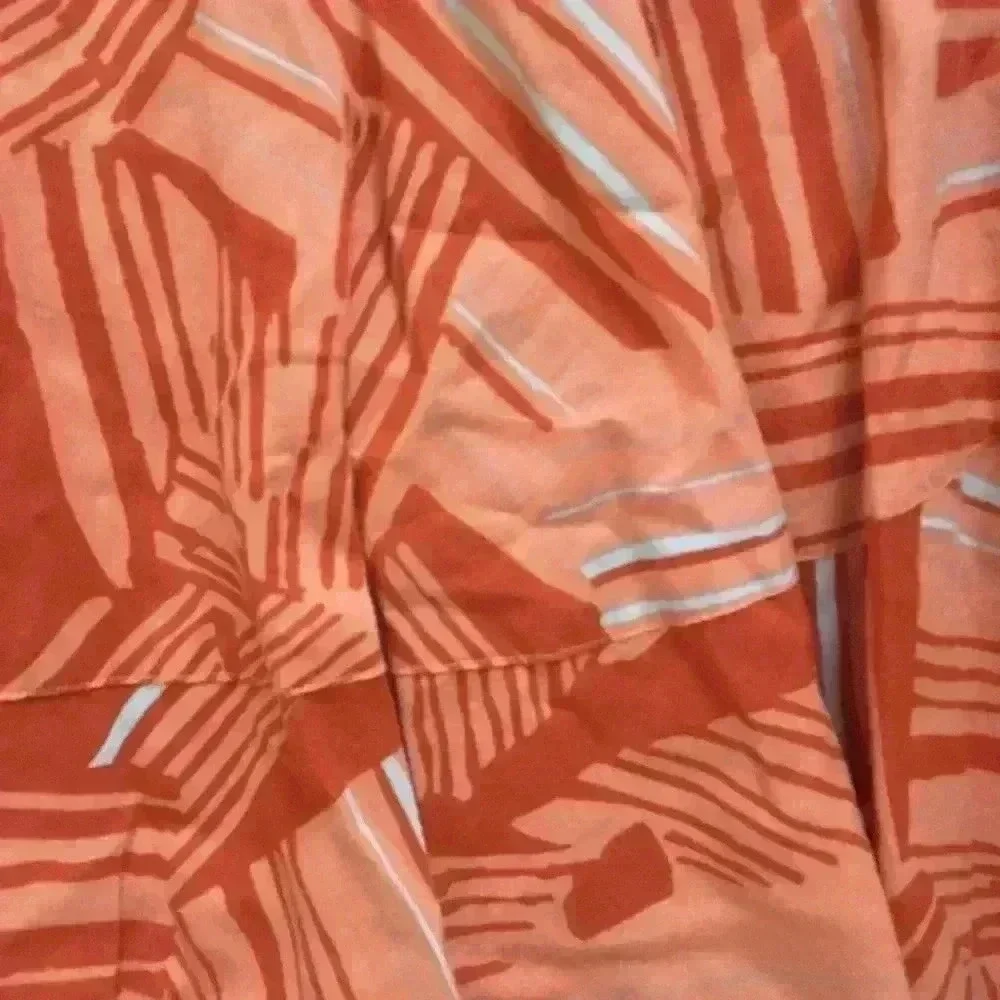 Anthropologie orange patterned midi‎ skirt